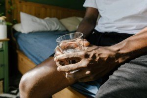 Man holding glass of water